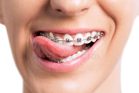 depositphotos_89993952-stock-photo-smiling-mouth-with-tongue-and.jpg